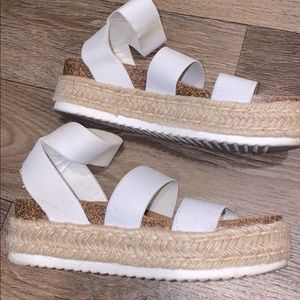 White platform sandals. So comfy